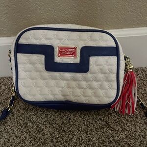 Betsey Johnson white quilted style cross body with red and blue accents